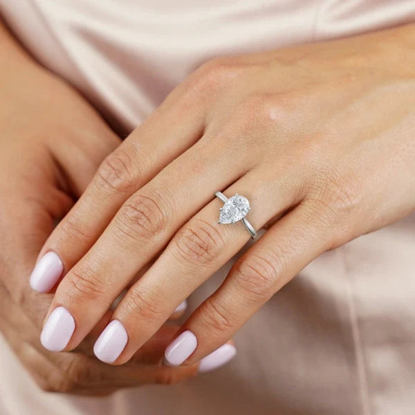 Bornreal Lab-Grown Diamond Pear Unique Hidden Halo Engagement Ring.