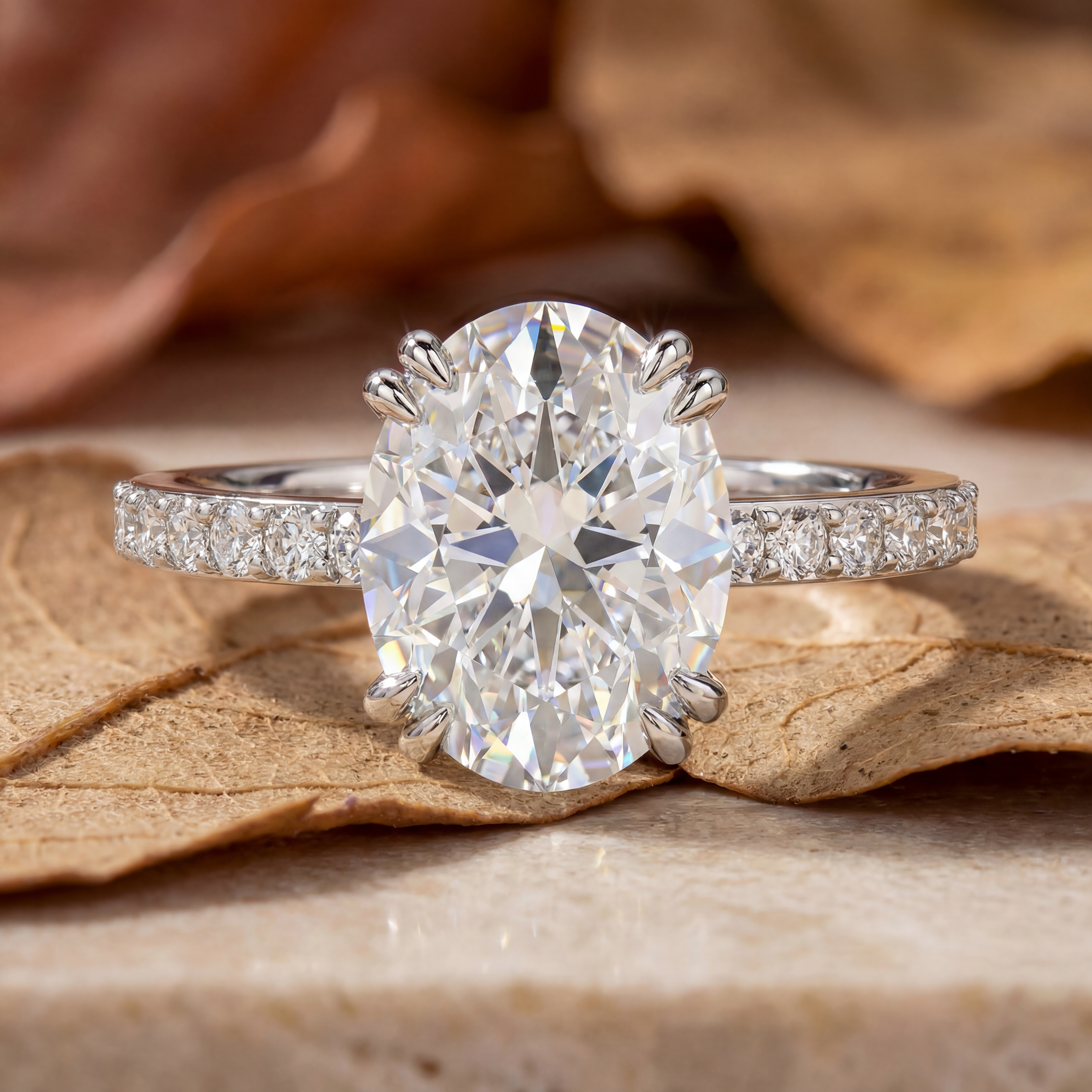 R0979 Oval Cut Eight-Prong Pavé Band Ring
